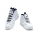 chaussure penny hardaway en blanc et bleu